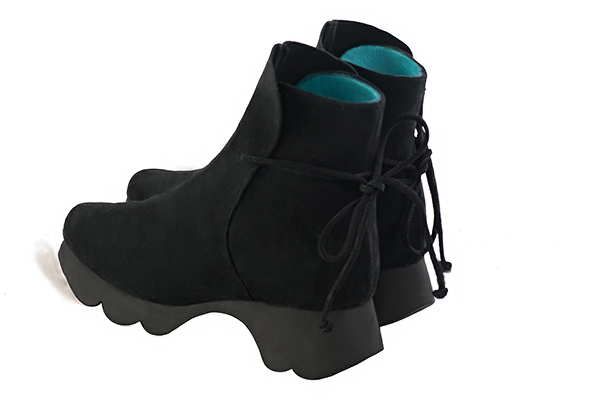 Matt black women's ankle boots with laces at the back.. Rear view - Florence KOOIJMAN